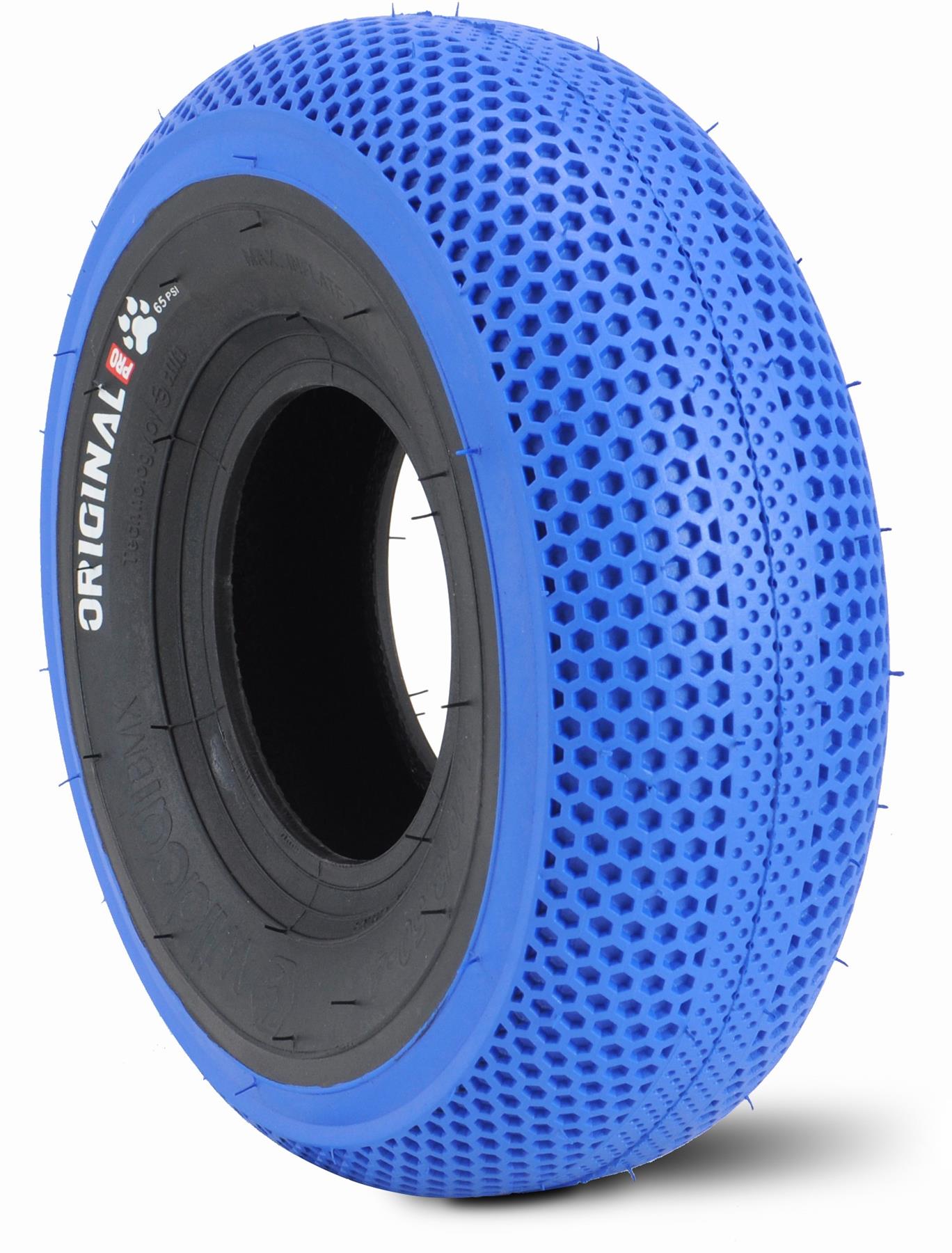 The Wildcat OG 3A Mini BMX Bike in Royal Blue features durable, blue airless honeycomb-patterned tires with "ORIGINAL" labeling and rubber spikes—ideal for riders wanting PRO Street 65PSI tyres and CNC aluminium rims.