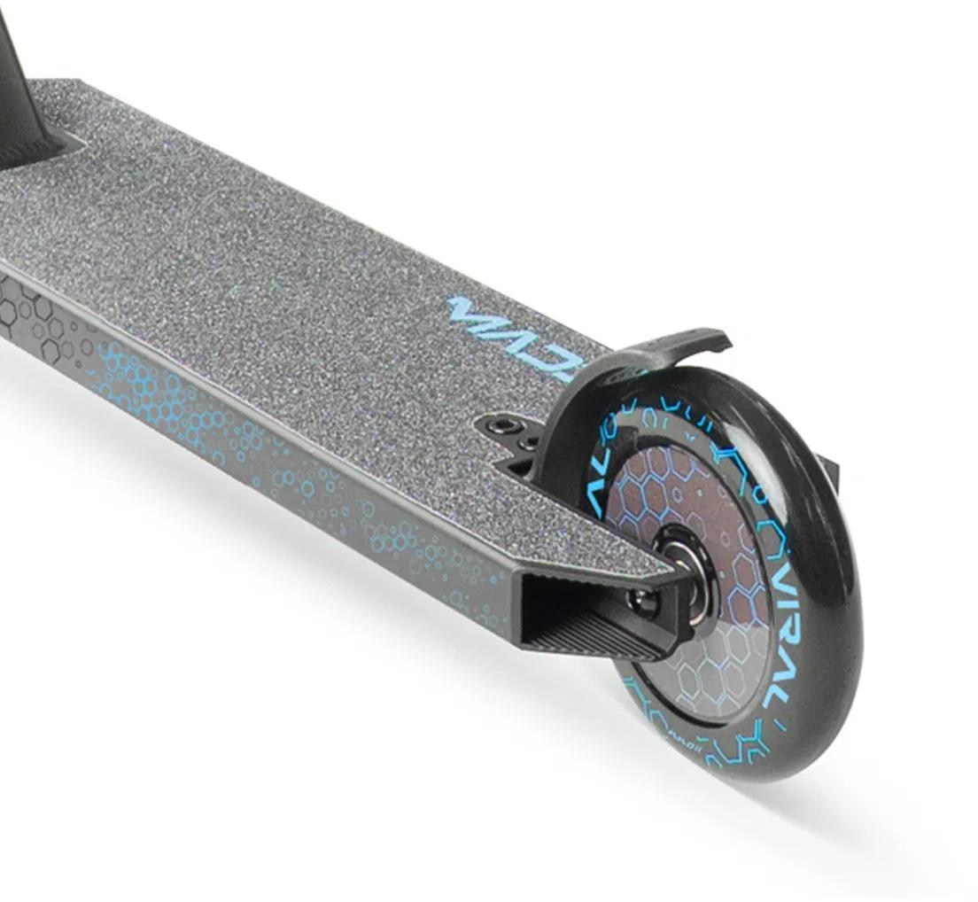 Close-up of the Madd Gear Viral Rave Complete Stunt Scooter - Velocity’s rear, highlighting its textured deck, black and blue rear wheel, and curved fender brake.