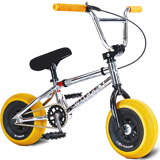 The Wildcat OG 3A Mini BMX Bike - Galaxy Gum by Wildcat features a chrome frame, black seat, black handlebars, pedals, CNC aluminum rims, bright yellow PRO Street 65PSI tires, and matching grips.