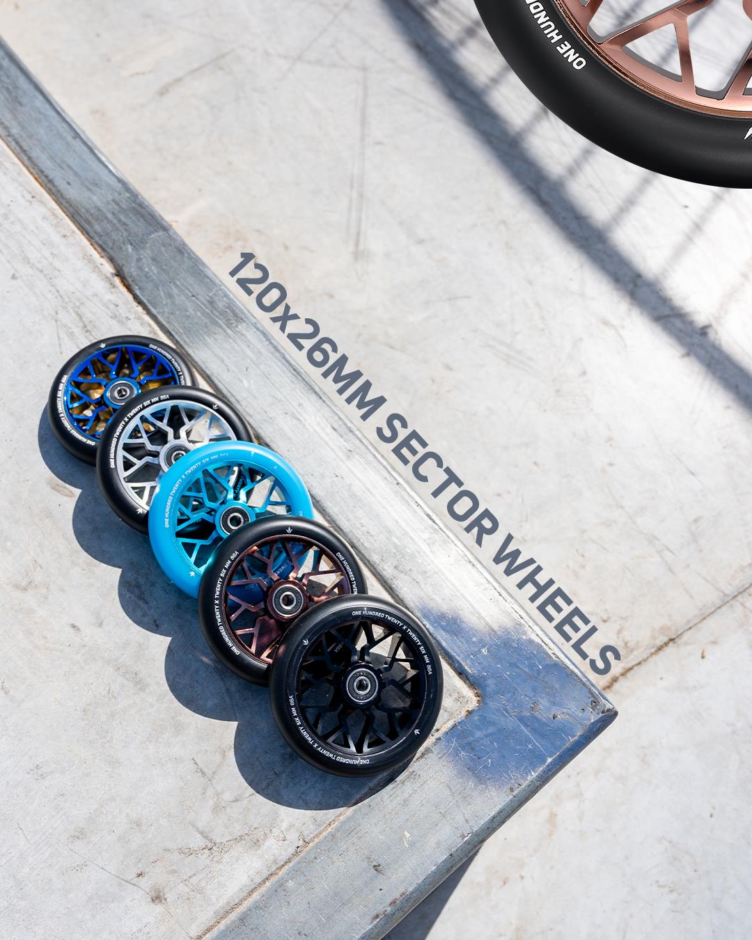 Five Blunt Envy Sector 120mm Stunt Scooter Wheels, including Silver, are arranged diagonally on a concrete ramp. The text "120x26mm Sector Wheels" highlights these wheels for Prodigy X ONE completes.