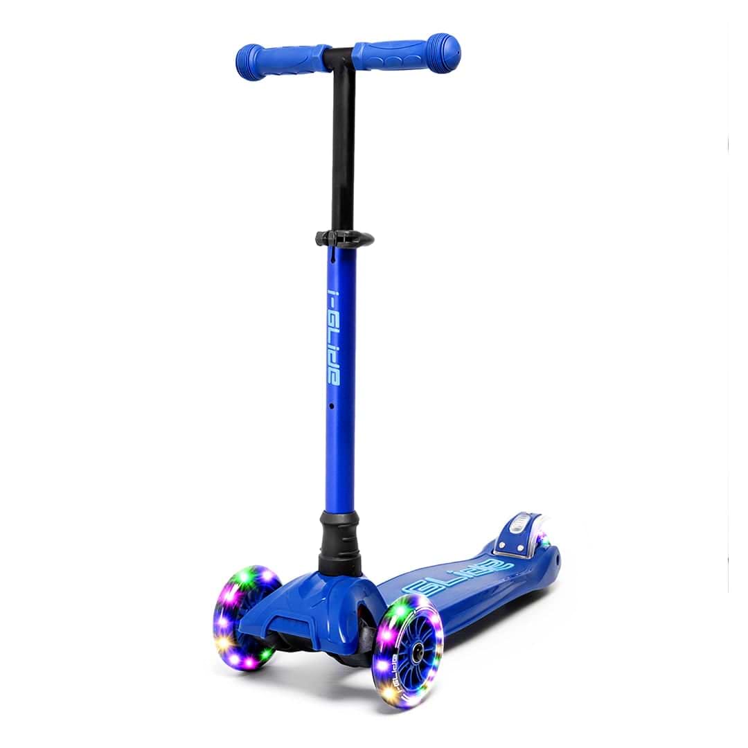The I-Glide i-Glide 3-Wheel LED Kids Scooter - Blue/Blue boasts a vibrant blue design with an adjustable height handlebar. Its front wheels light up with colorful LEDs, enhancing the sleek deck set against a plain white background.