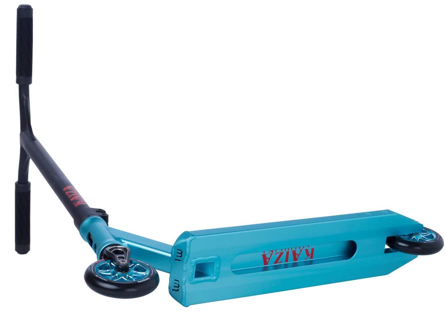A teal and black Longway Kaiza Complete Pro Stunt Scooter lies on its side, showing the deck, wheels, and handlebars. "KAIZA" is printed in bold red on the deck—a standout Longway scooter built for tricks at the skatepark.