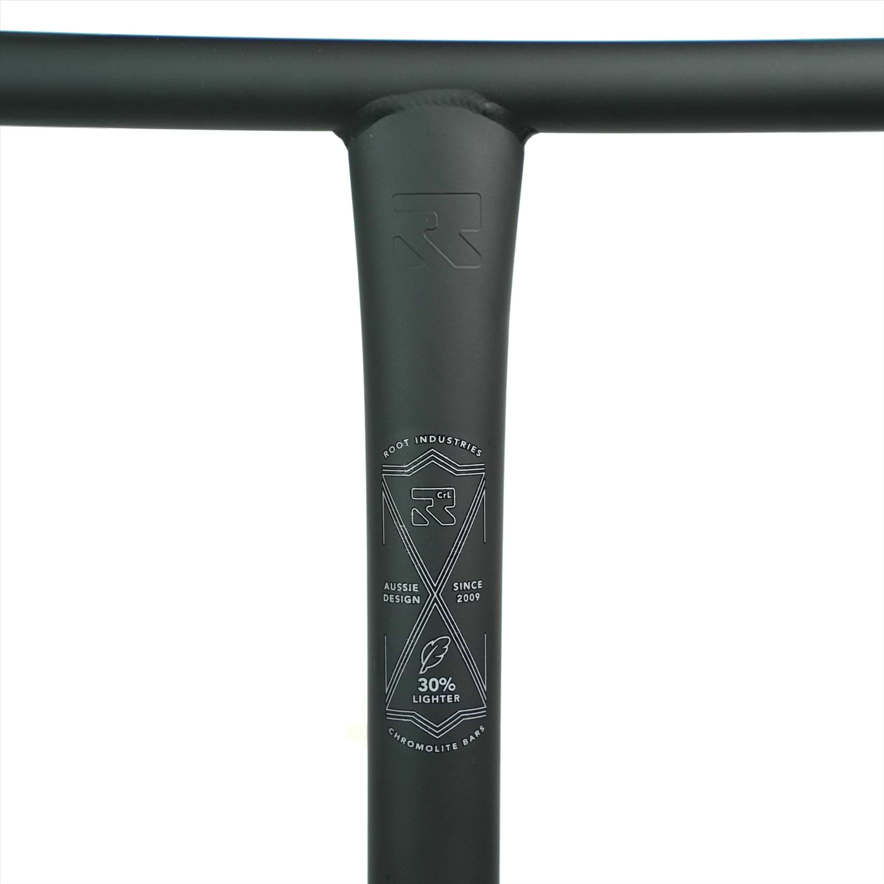 A close-up of the black handlebar stem displays the "Root Industries" logo and text: "Aussie Design," "Since 1200," and "Chromoly Lite Bar, 30% Lighter." The Root Industries ChromoLite Steel Oversized HIC Stunt Scooter T-Bars - Black 620mm x 600mm features a smooth matte finish.