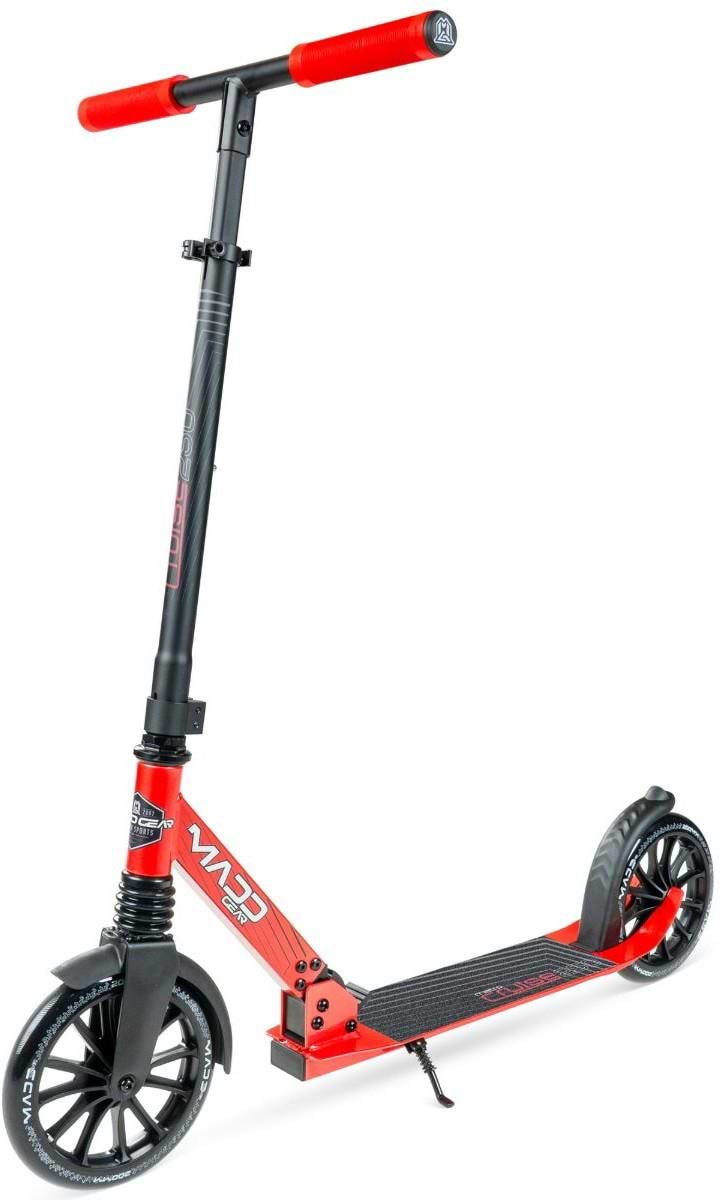 The Madd Gear Metro Cruise 250 Foldable Commuter Scooter by MGP features large wheels, a textured deck, adjustable black handlebar with red grips, and a sleek black/red design. Stands upright on a white background.
