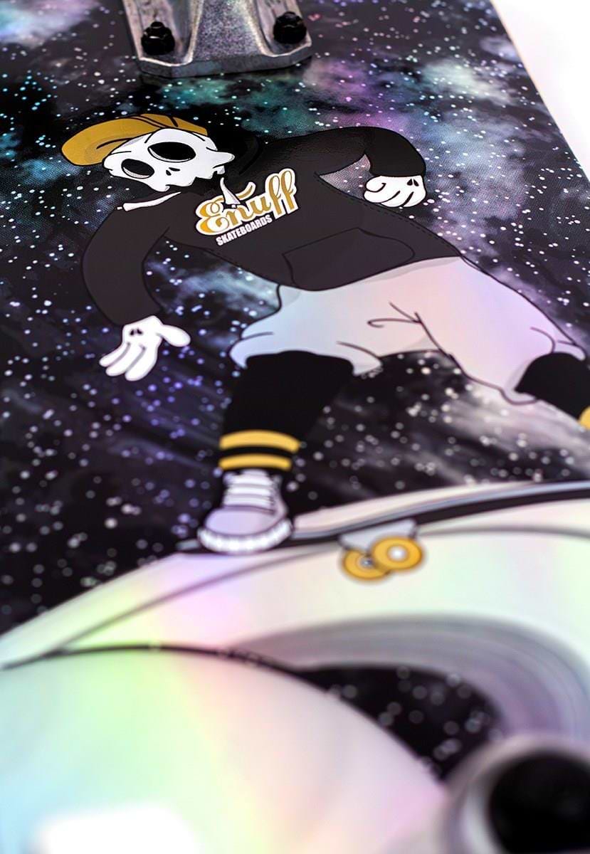 Experience the Enuff Skully Hologram Black Complete Skateboard, featuring a cartoon skull in streetwear on a 7-ply maple deck. Its vibrant cosmic background and striking holographic effect offer style and durability for entry-level skaters.