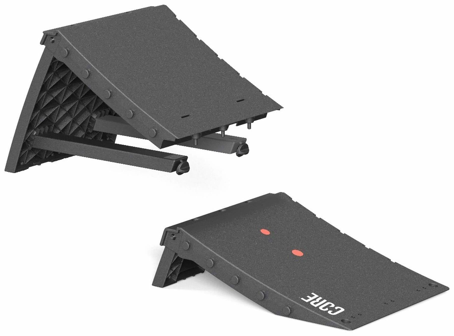 Two black CORE XL Kicker Ramp Extenders by CORE are shown—one open to display its support structure, the other closed. Both have a textured surface and "CORE" label, ideal for adjusting ramp height with a kicker extender.