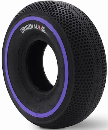The Wildcat Original Pro 10" Mini BMX Tyre features a black honeycomb tread, a purple sidewall strip, and "ORIGINAL" in white—ideal for your Wildcat Pro Mini BMX.