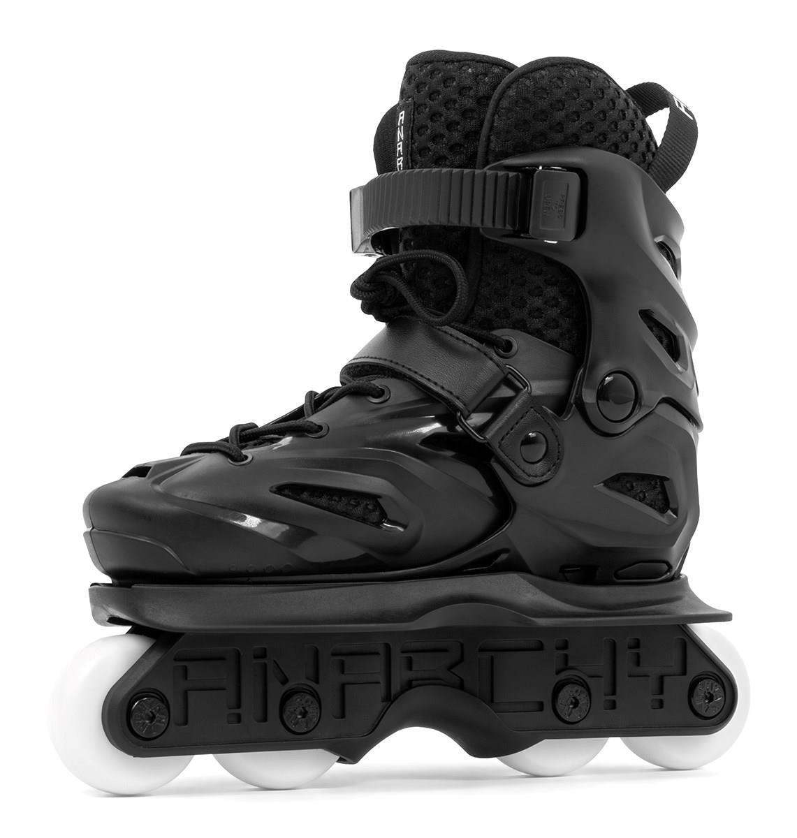 The Anarchy Unity Adjustable Aggressive Inline Skates - Black feature a hard plastic shell, high rebound PU wheels, secure straps, and have "ANARCHY" embossed on the black frame above the wheels.