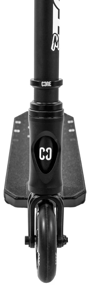 Front view of the CORE CG1 Mini Complete Stunt Scooter in black, featuring a single front wheel, black deck, and "CORE" branding on the handlebar stem.