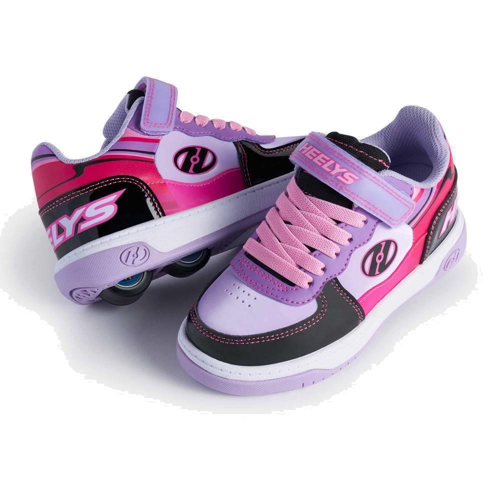 The Heelys Rezerve Low X2 Girls Shoes in Black, Purple, and Pink by Heelys showcase a two-wheel design—one shoe stands upright to display the side and logo, while the other tilts to reveal the wheels and sole.