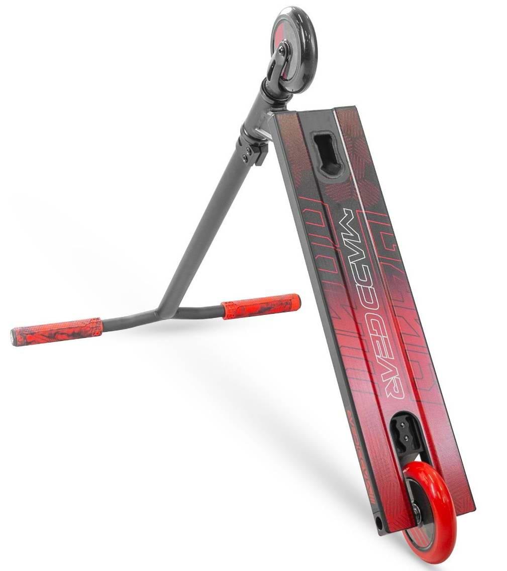 The Madd Gear (MGP) MG 3 Zen Complete Stunt Scooter in black/red, featuring "MADD GEAR" on the deck with red handgrips and wheels, is shown from an angled side view against a white background.