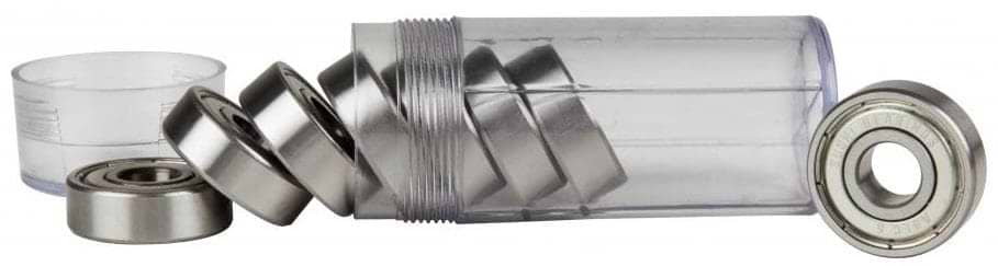 A clear tube containing Sushi Chrome ABEC 5 Skateboard Bearings by Sushi rests on its side, with several shiny cylindrical bearings neatly arranged around it. A detached cap lies to the left, highlighting the quality of this 8-pack set.