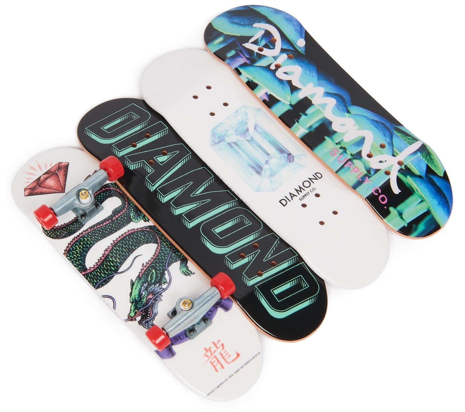 Four Tech Deck M01 Deluxe 4 Pack Fingerboards - Diamond are lined up: two show colorful "Diamond" logos on the decks, and two display wheels up with graphics—a dragon and a red diamond with Chinese characters.