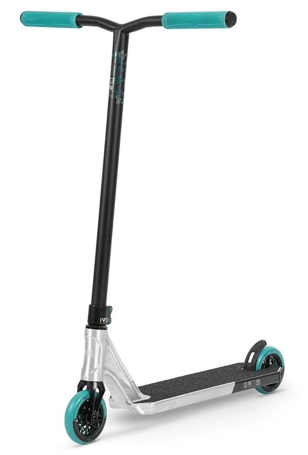 Introducing the Invert Supreme Journey 4 Jamie Hull Complete Stunt Scooter - a stylish ride in raw and teal. This sleek scooter showcases Typhoon cro-mo bars and features teal grips and wheels. Its lightweight alloy deck comes in a raw finish with a textured black surface for enhanced grip, perfectly complementing its minimalistic frame.