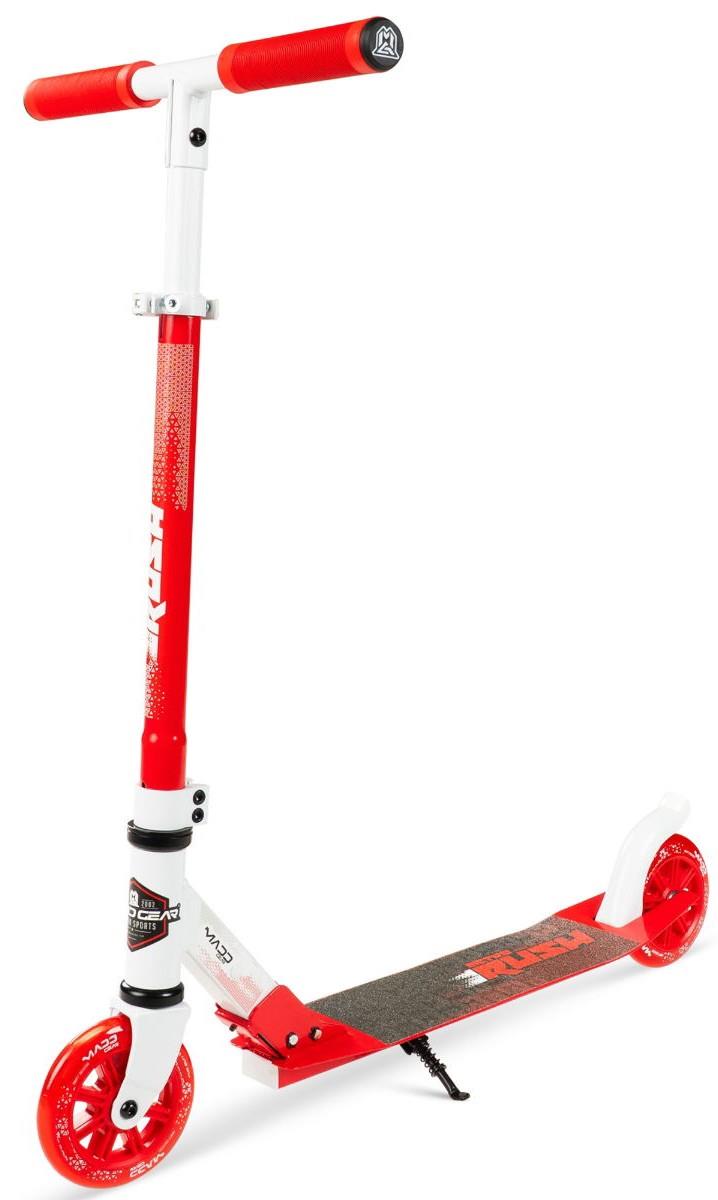 The Madd Gear (MGP) Metro Rush 125 Kids Foldable Scooter in White/Red features two large wheels, a black grip deck, adjustable red handlebars, and a kickstand. Shown on a white background.