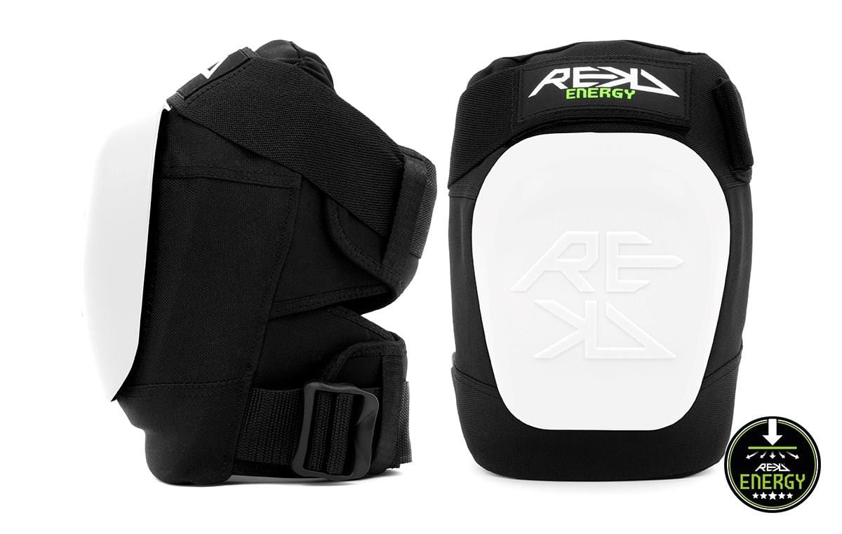 Introducing the REKD Energy Patrol Ramp Knee Skate Protection Pads: ideal for adrenaline junkies. These black and white pads feature protective white fronts, adjustable black straps, and a stylish brand name at the top. Completing this essential knee protection gear is a vibrant green star logo accompanied by "Energy.