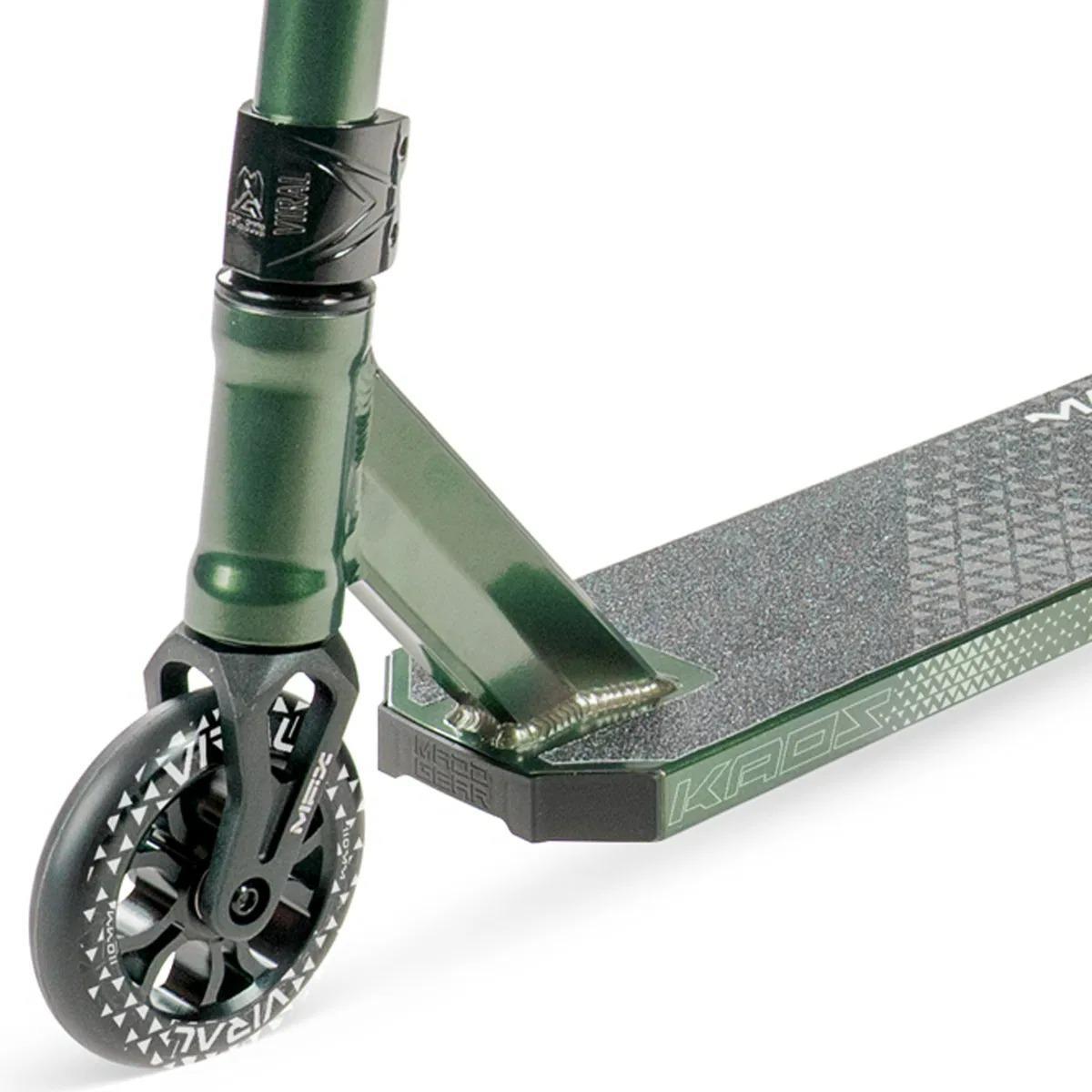 Close-up of the Madd Gear Viral KAOS Complete Stunt Scooter - Forest, highlighting the handlebar, clamp, front wheel, and textured deck with geometric patterns and "KADZ" branding—ideal for stunt progression.