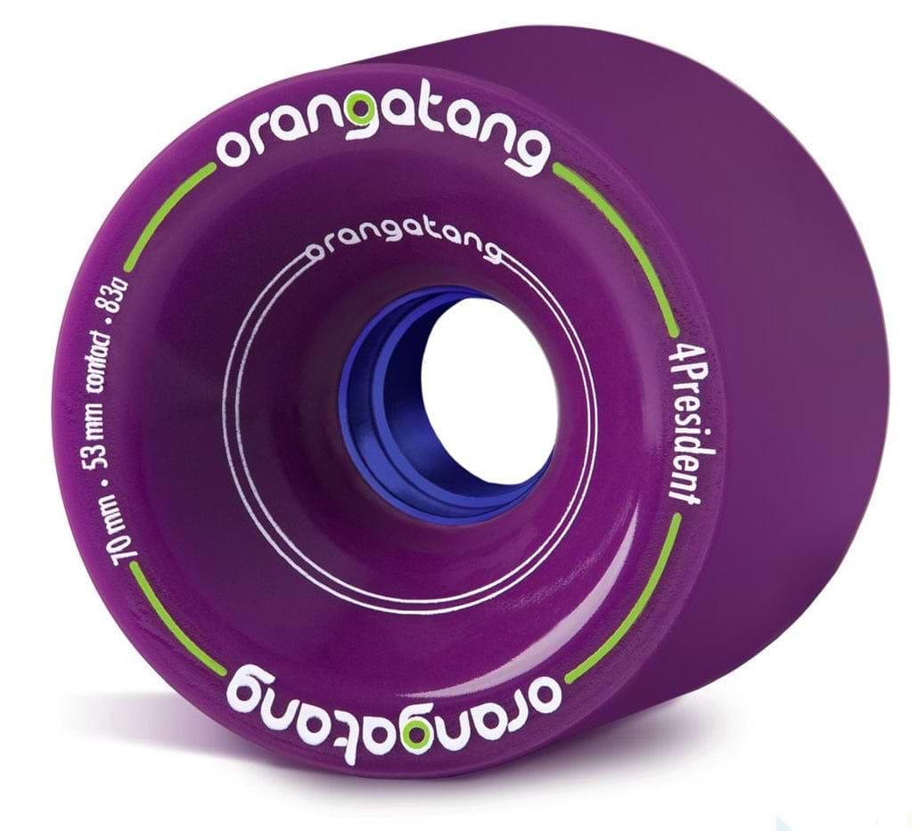 A close-up of a purple longboard wheel displays the brand name "Orangatang" and product model "4President" in white text. Featuring a blue inner core, this wheel measures 70mm with an 83a durometer hardness rating, ideal for smooth rides.