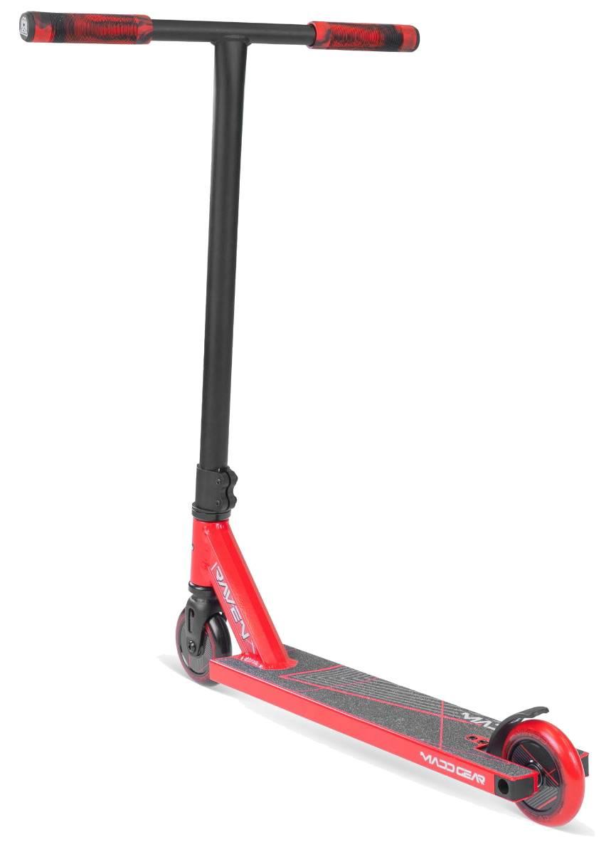 The Madd Gear (MGP) MG 1 Raven Complete Stunt Scooter in red and black features a T-shaped handlebar, two small wheels, and a textured foot deck, shown angled to display the front and side views.