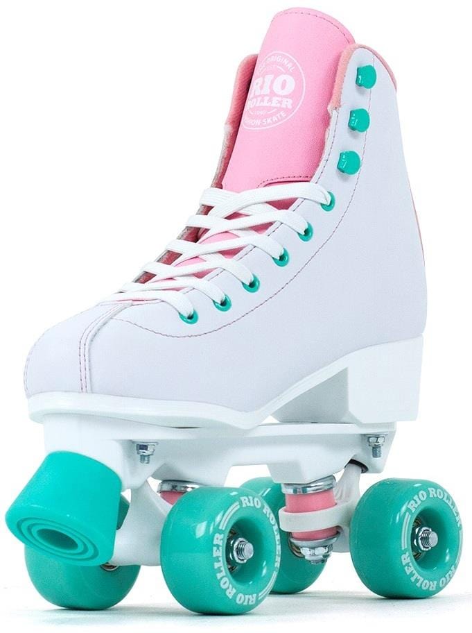 The Rio Roller Artist Quad Roller Skates - Flora features a white design with pink accents, teal wheels, artistic teal eyelets, a pink tongue, and prominent "Rio Roller" branding on the tongue and wheels.