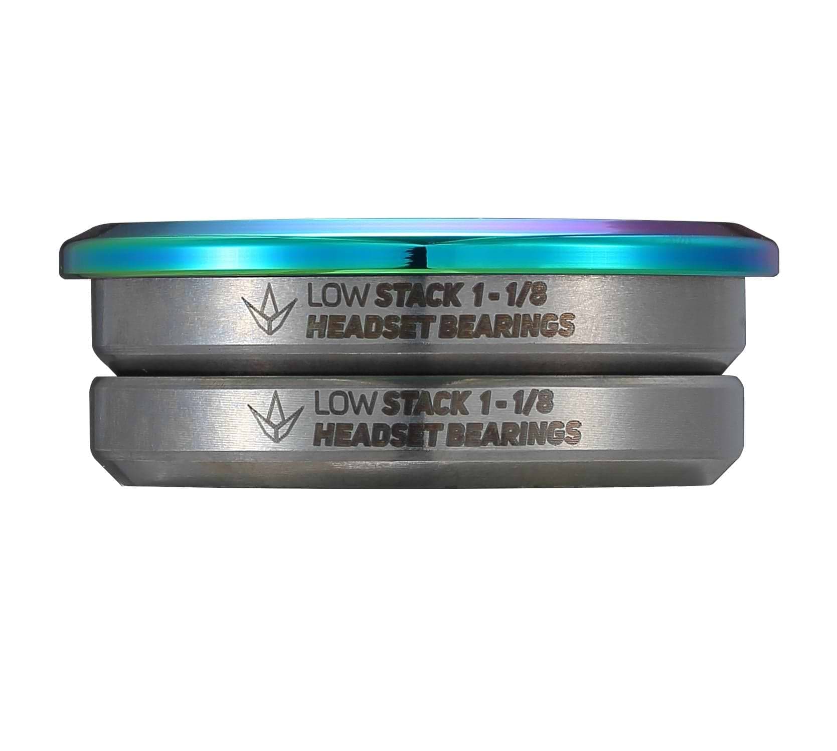 Two Blunt Envy Low Stack SCS Integrated Stunt Scooter Headset bearings are stacked, engraved with "LOW STACK 1-1/8" and "HEADSET BEARINGS." The top edge has a vibrant, oil slick neochrome finish over a silver-gray body. These sealed bearings are ideal for SCS Stunt Scooter Headsets or Blunt Envy setups.