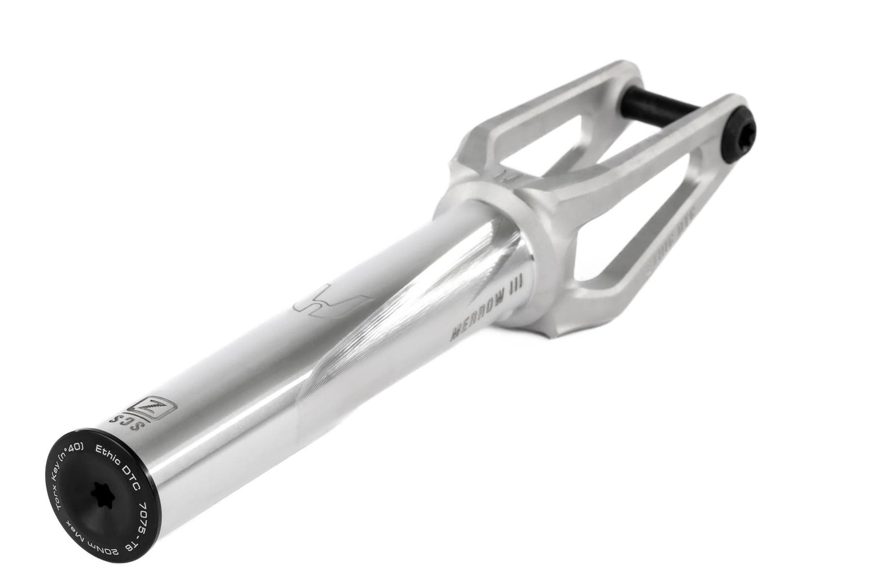 The Ethic DTC Merrow V3 SCS Stunt Scooter Fork by Ethic is crafted from 7075 aluminium in raw silver, featuring a sleek, angular design with a black bolt and laser-etched markings—one of the lightest forks available.