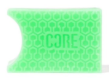 The CORE Epic Skate Wax in Apple Green is a rectangular skate accessory designed with a honeycomb pattern and the imprinted brand name "CORE". It features pre-grooved shapes for easy application and includes a small semi-circular indentation on one side.