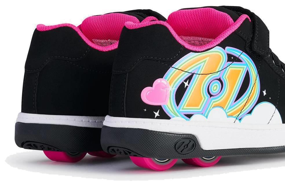 The Heelys Kolect X2 Girls Shoes by Heelys in Black/Hot Pink/Multi feature a two-wheel design and vibrant side graphics with rainbows, clouds, hearts, and sparkles for extra style.