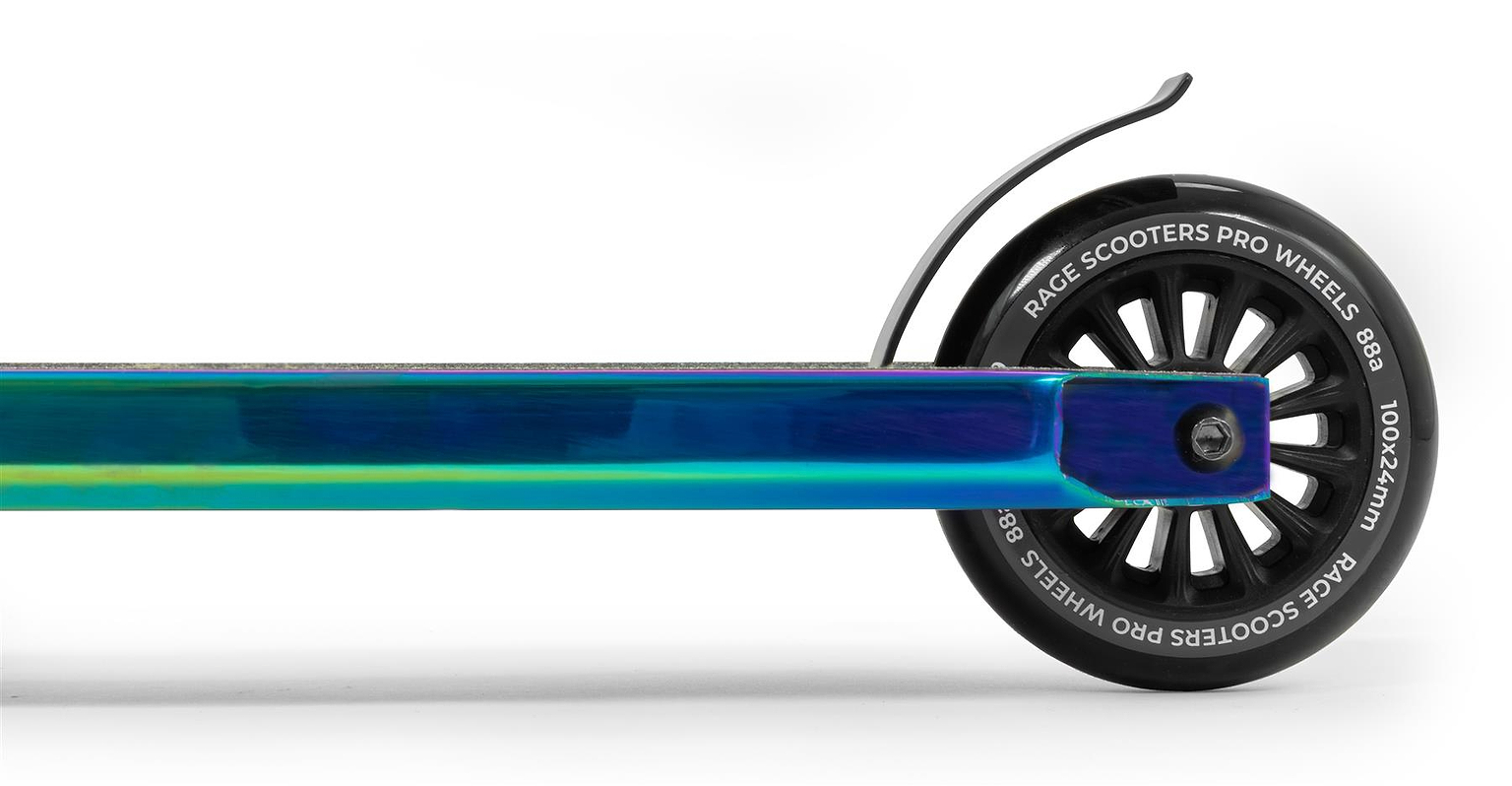 Close-up side view of the rear wheel and deck of the Slamm Rage Complete Stunt Scooter - Neochrome by Slamm, featuring black wheels and a black brake, set against a white background.