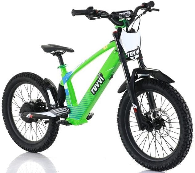 The Revvi 20" Kids Electric Balance Bike - Green features black handlebars, off-road tires, a sturdy stand, and front disc brake. The frame sports a white and black logo with a black seat and front mudguard. The bike is presented on a plain white background.