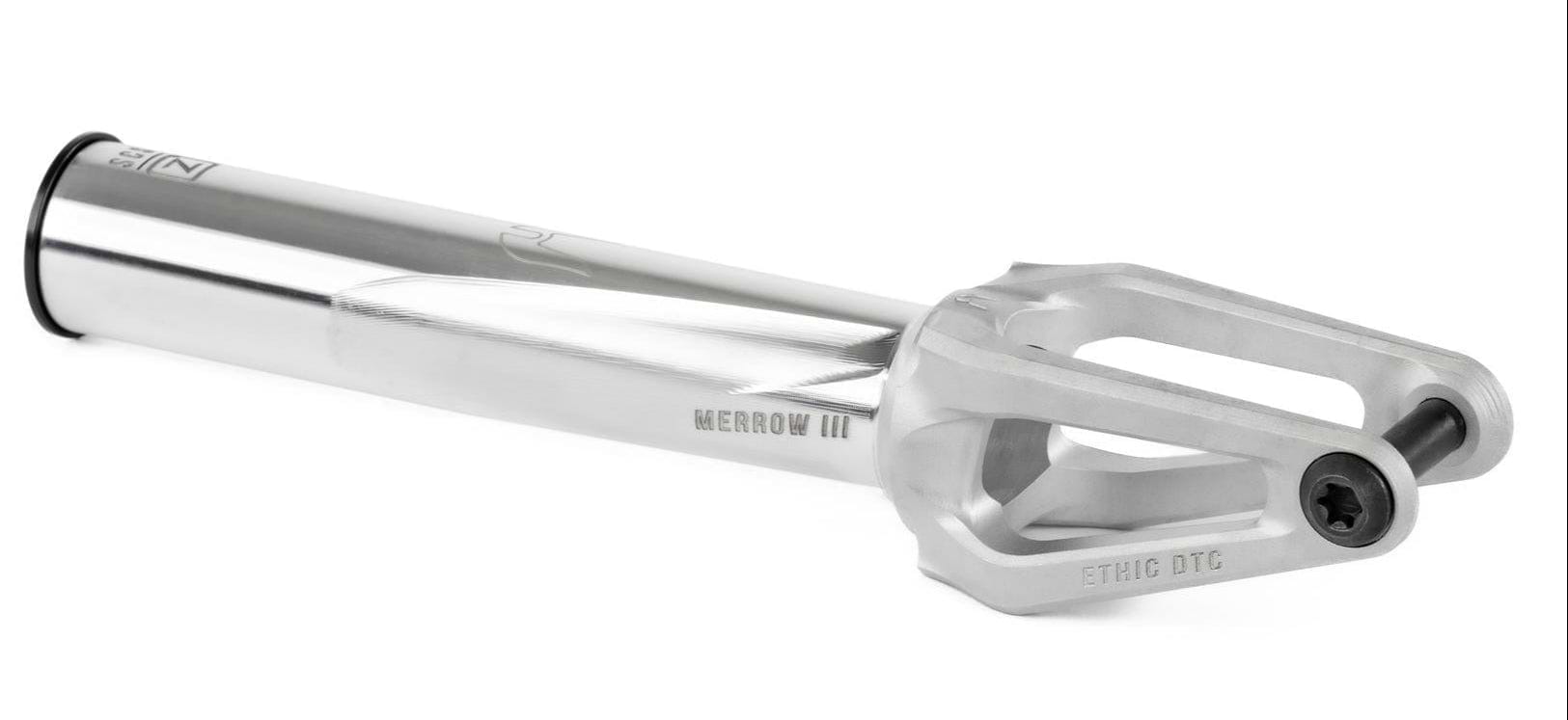 The Ethic DTC Merrow V3 SCS Stunt Scooter Fork in raw silver, crafted from 7075 aluminium with a cylindrical tube and open-ended pronged base engraved “ETHIC DTC” and “MERROW III,” is among the lightest forks, shown on a white background.