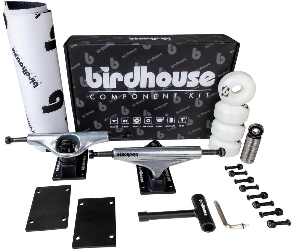 The Birdhouse Skateboard Silver / Black Component Set - 5.25" includes trucks, ABEC 5 bearings, wheels, hardware, riser pads, grip tape, and tools—displayed in front of a Birdhouse-branded box.