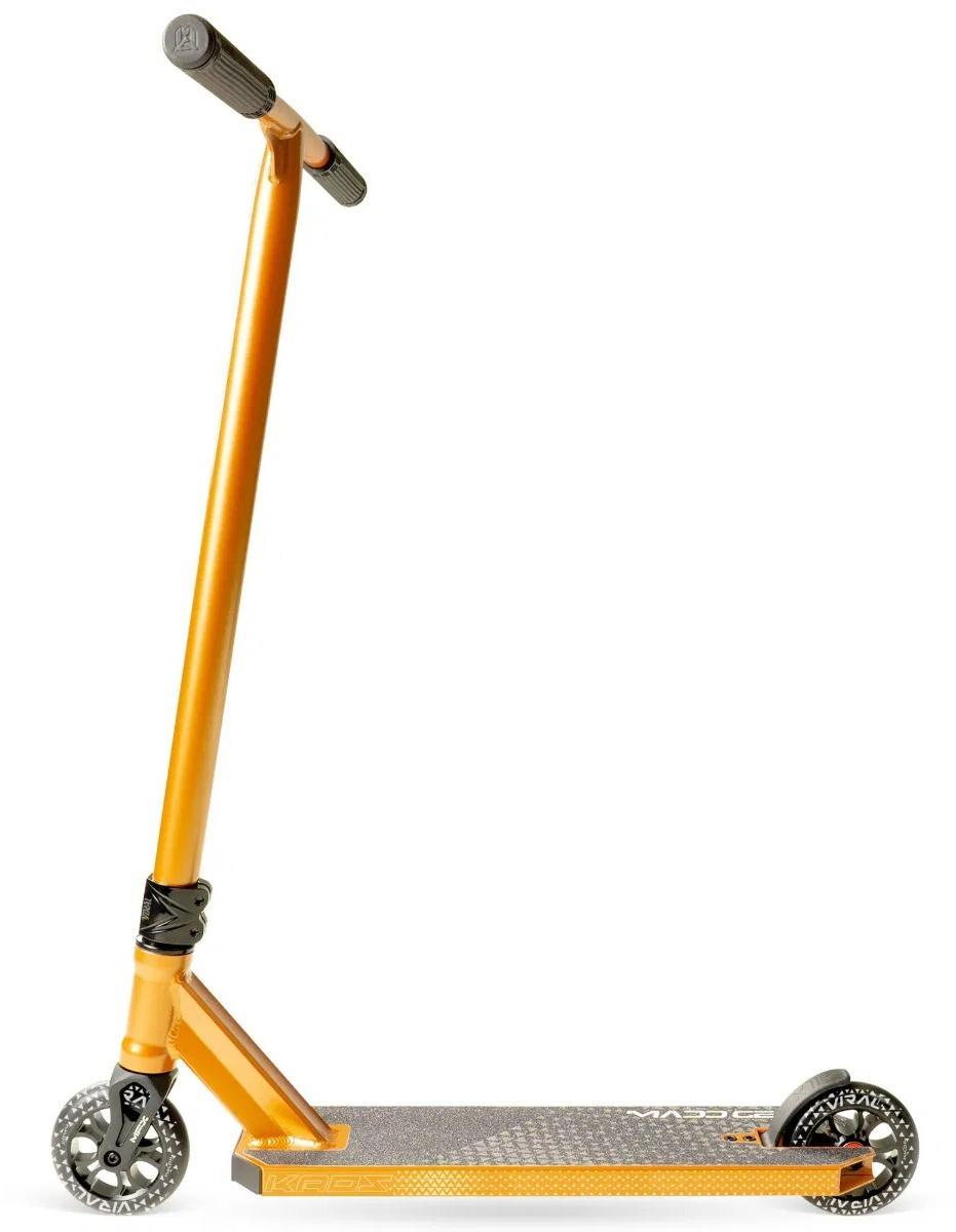 The Madd Gear Viral KAOS Complete Stunt Scooter - Copper by Madd Gear (MGP) features a copper finish, textured deck, black grips, and silver wheels. Shown from the side against a white background.