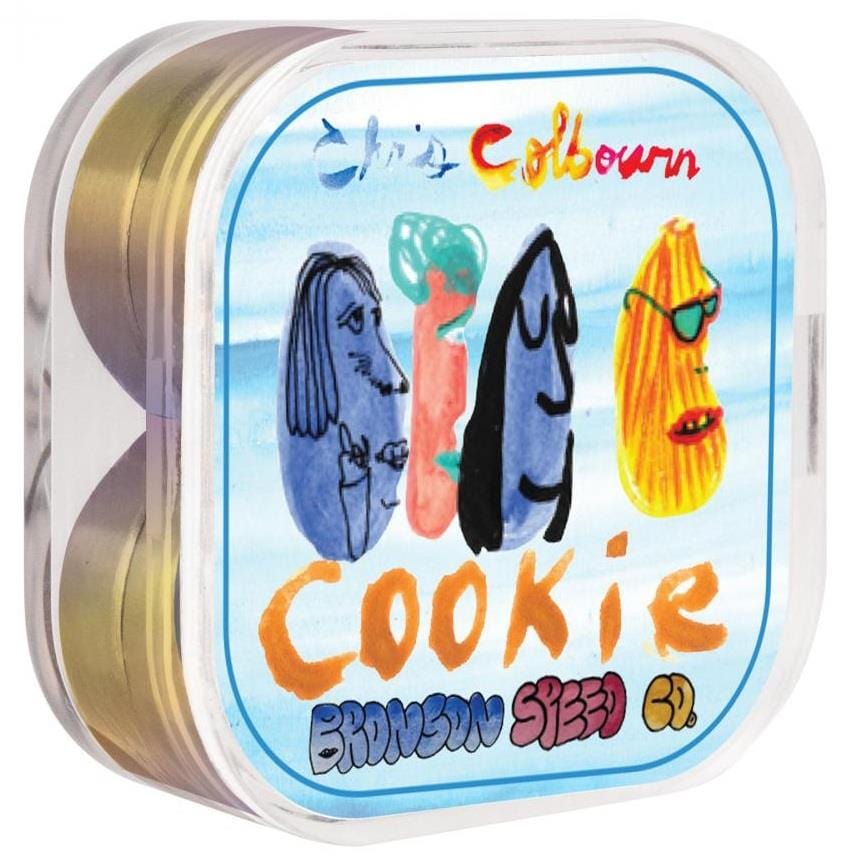 A transparent square container featuring the Bronson Speed Co. Chris Cookie Colbourn Pro G3 Skateboard Bearings, with an abstract, colorful lid design showcasing quirky cartoon characters and the words "Cookie" and "Chris Cookie Colbourn.