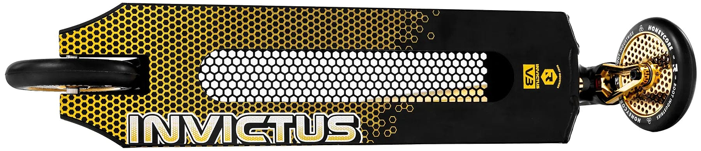 Top-down view of the Root Industries Invictus V3 Complete Stunt Scooter - Burnt Gold, featuring a honeycomb deck pattern, bold "INVICTUS" text, and striking gold wheels and hardware.