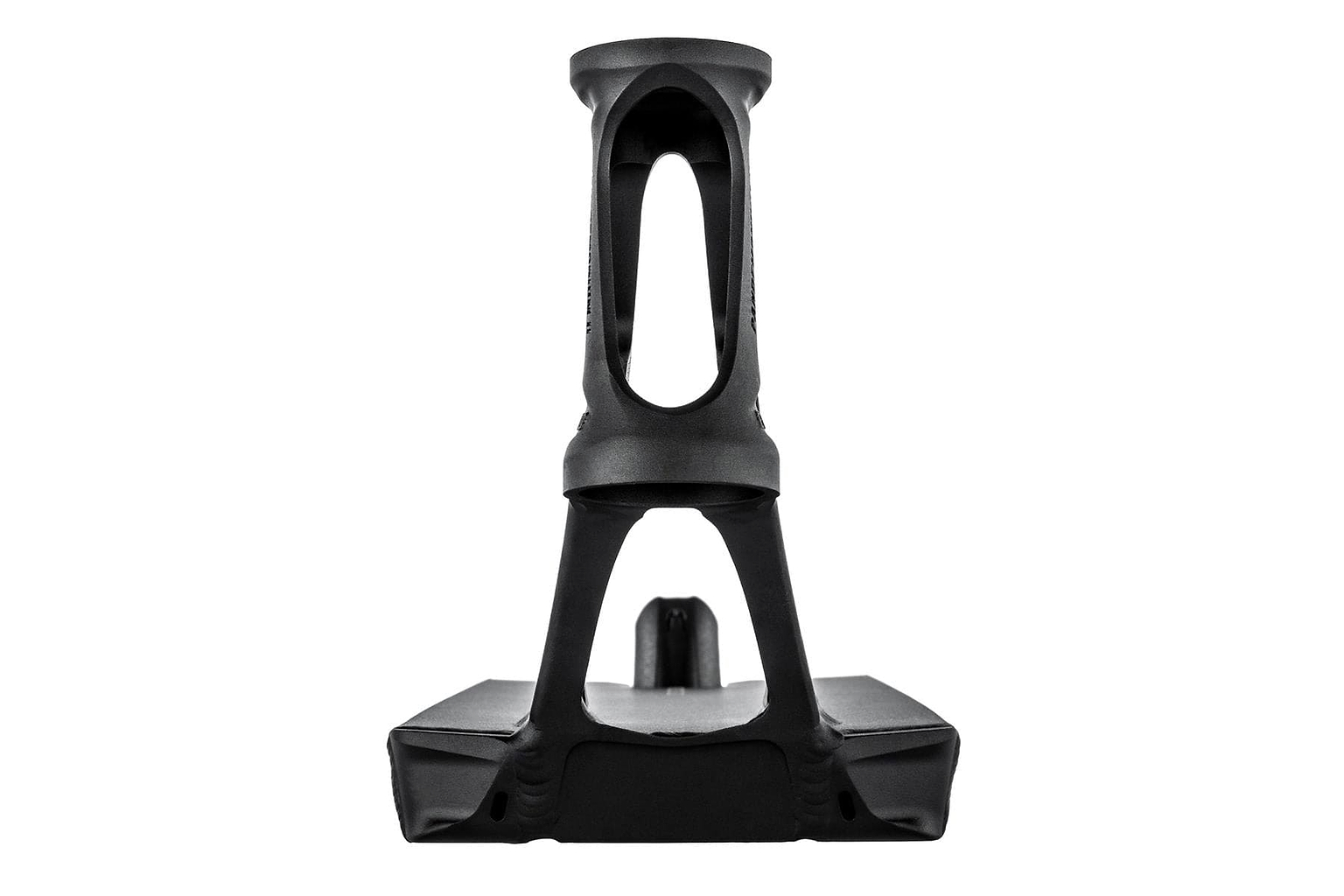 When viewed from the front, the ultra-lightweight design of this stand exhibits a black, intricately crafted plastic structure featuring geometric cutouts. Similar to the Ethic DTC Pandemonium V2 Boxed Black Stunt Scooter Deck measuring 5.5" x 22.8", it boasts a rectangular base and a tall, hollow vertical section with an arch-like shape in the middle.