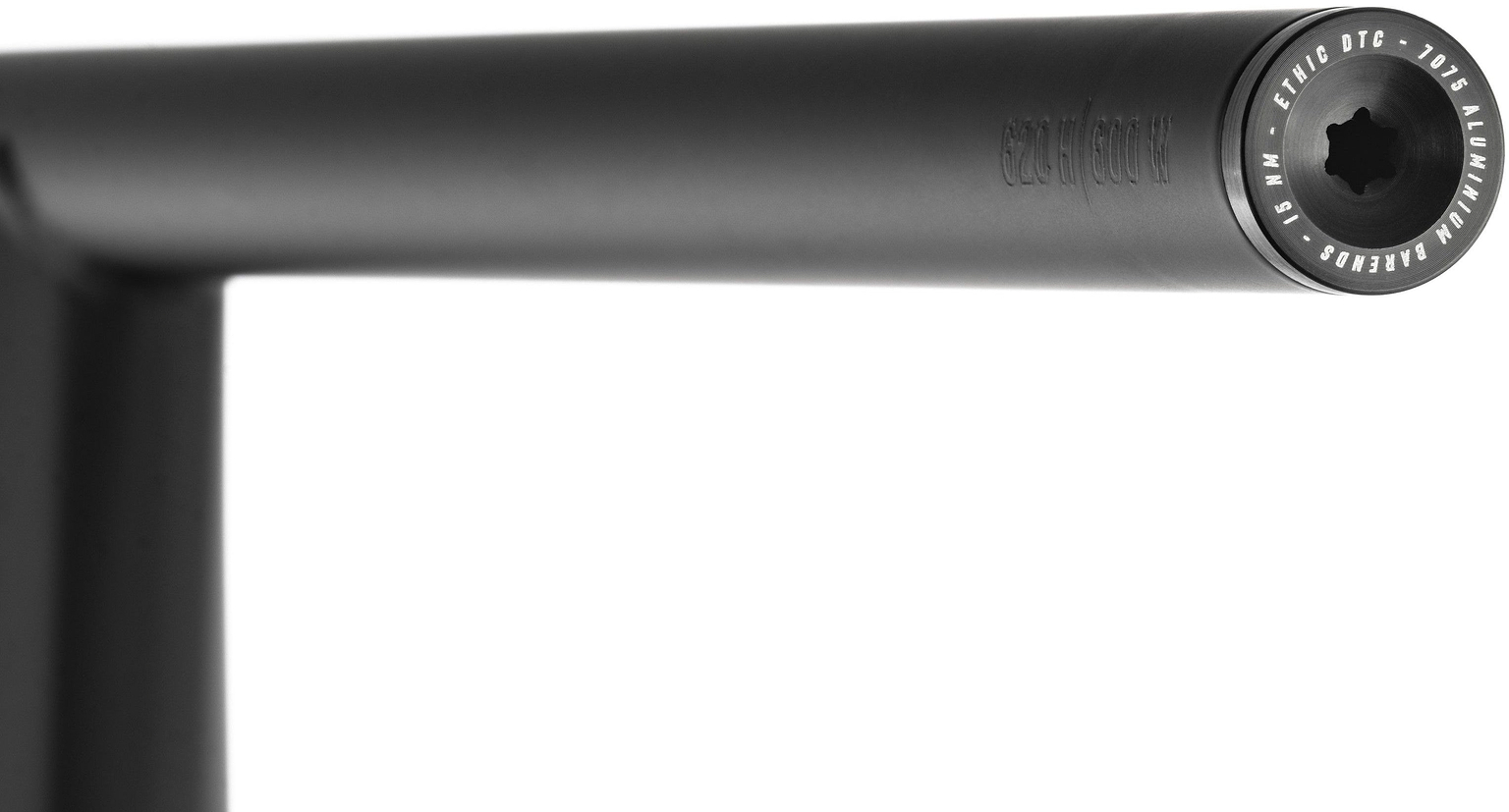 Close-up of the Ethic Flush Aluminium Stunt Scooter Bar Ends in black, showcasing a visible bolt head at the end of the black metal handlebar. The bar end is engraved to indicate it is crafted from 7050 aluminum, highlighting its durable and stylish design by Ethic. The background is white.