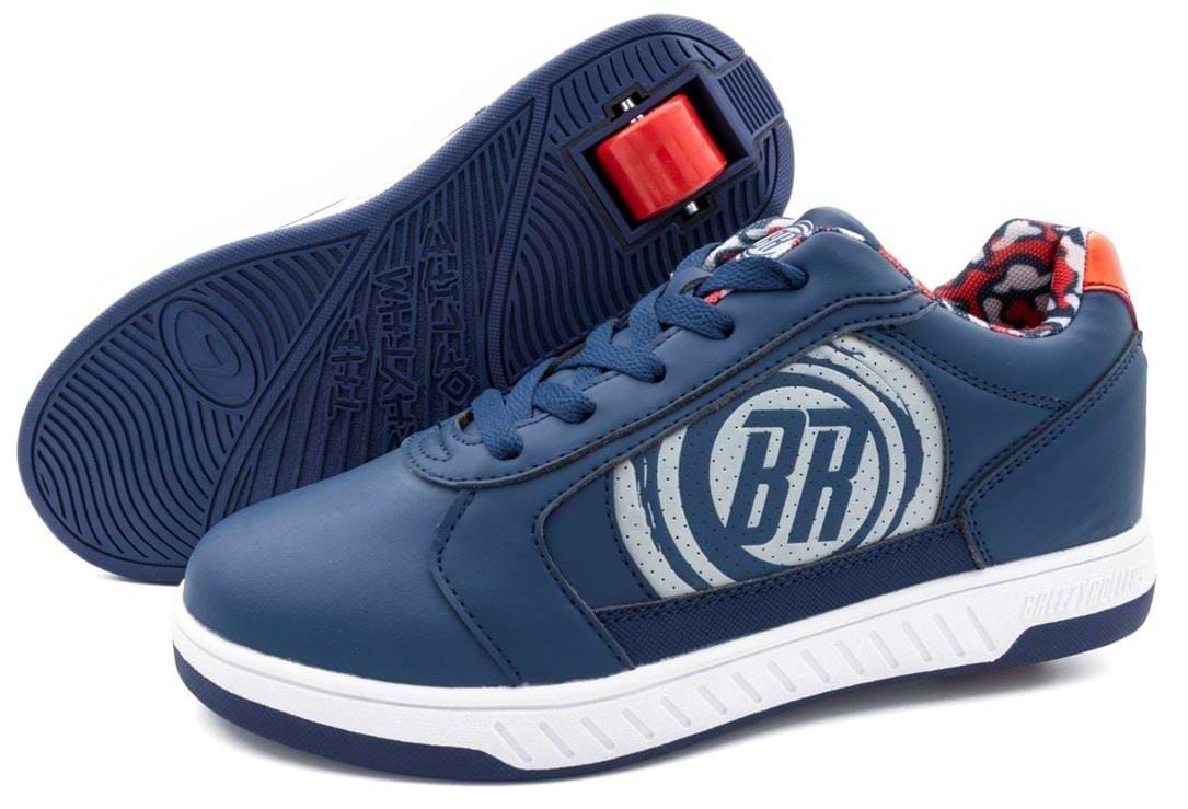 The Breezy Rollers Hero 2 Shoes - Blue by Breezy Rollers feature white soles, a circular "BR" logo, a red retractable wheel in one sole for their patented system, and a red-and-white patterned inner lining.