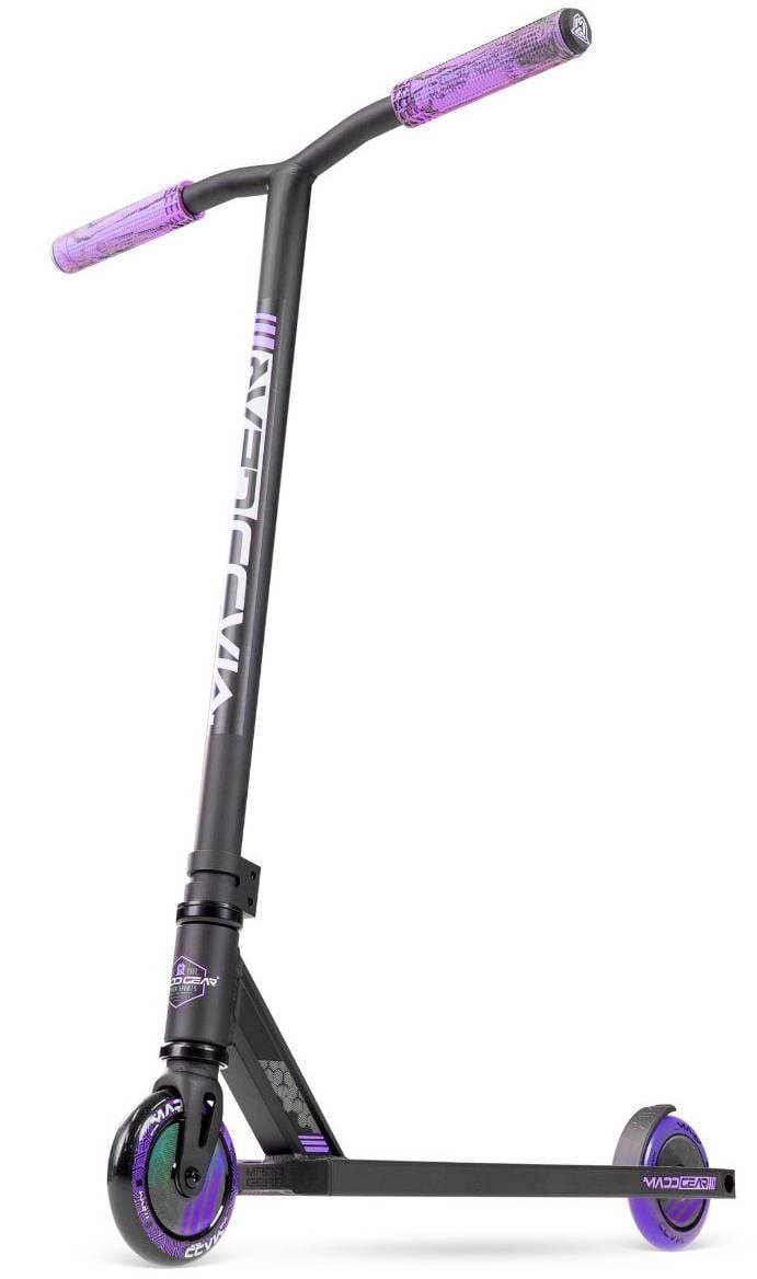 A Madd Gear MG 3 Zen Complete Stunt Scooter in Black/Lavender, featuring the Madd Gear logo on the stem and green/black wheels, stands upright against a white background. Brand: Madd Gear (MGP).