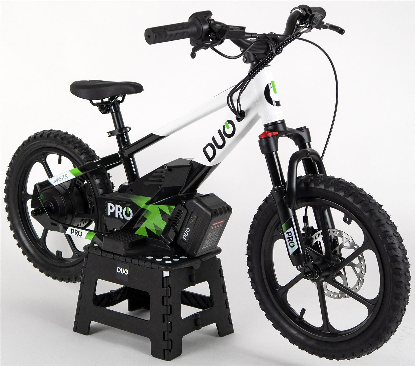 The Duo 16" Master Pro Kids Electric Balance Bike in white and black, featuring thick tires and training wheels, is shown on a black stand against a plain white background.