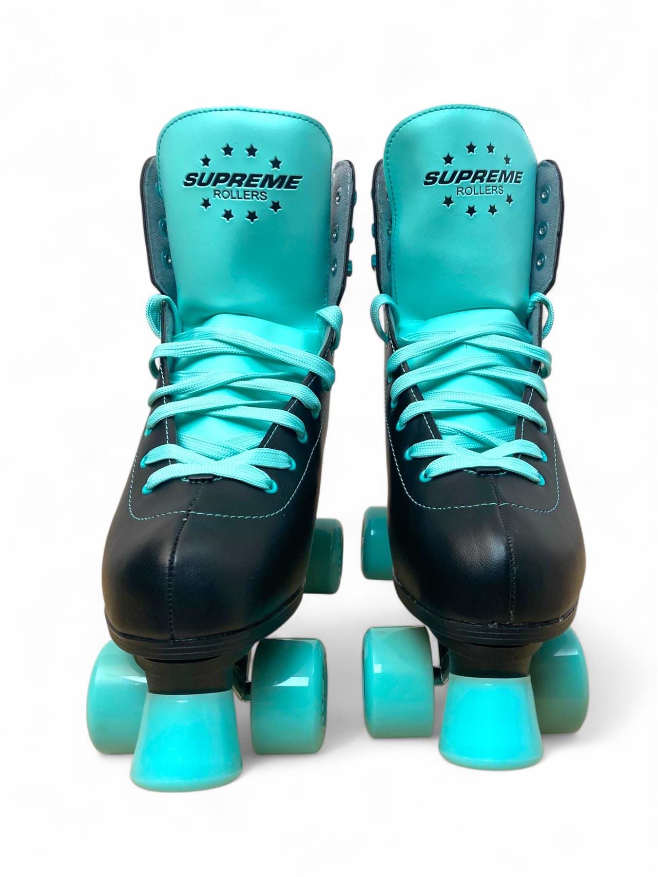 A pair of Supreme Del Rey Adjustable Quad Roller Skates in black with turquoise laces and wheels, shown from the front against a plain white background.