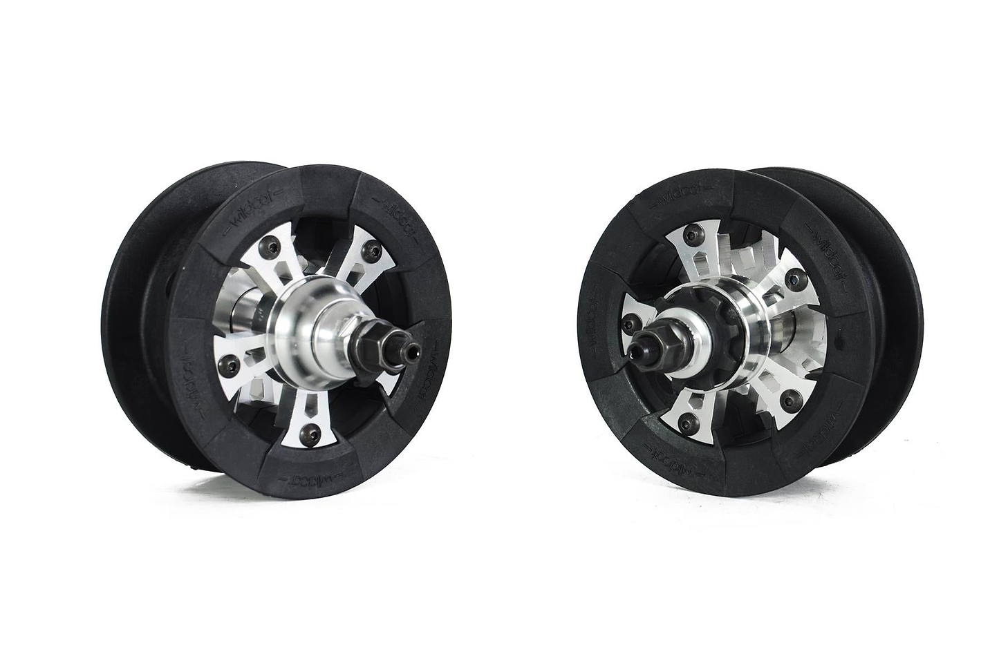 Two black and silver Wildcat pulley wheels for the OG Pro Mini BMX Bike - Joker Blue Neochrome are displayed on a white background, angled to highlight their turbo-inspired design with metal hubs and rubber edges.