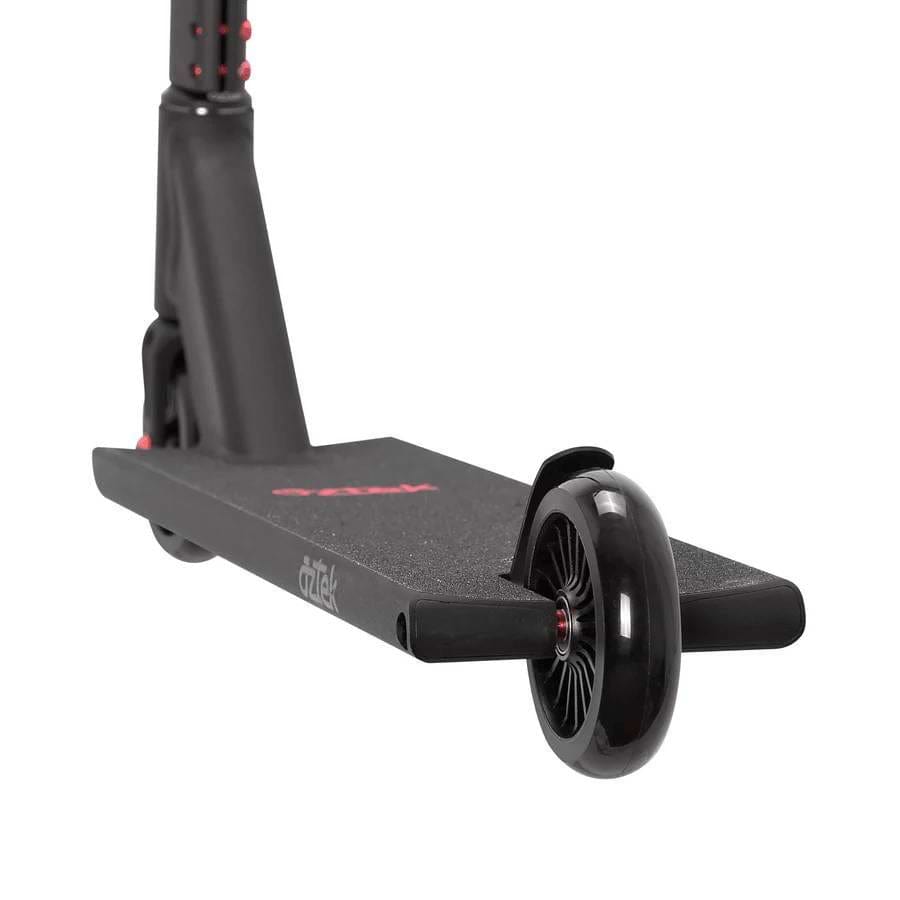 Close-up of the Aztek Siren Complete Street Stunt Scooter - Black, highlighting the grip deck, rear wheel with fender, and part of the handlebar stem. The Aztek scooter features a sleek, modern design for street stunts.