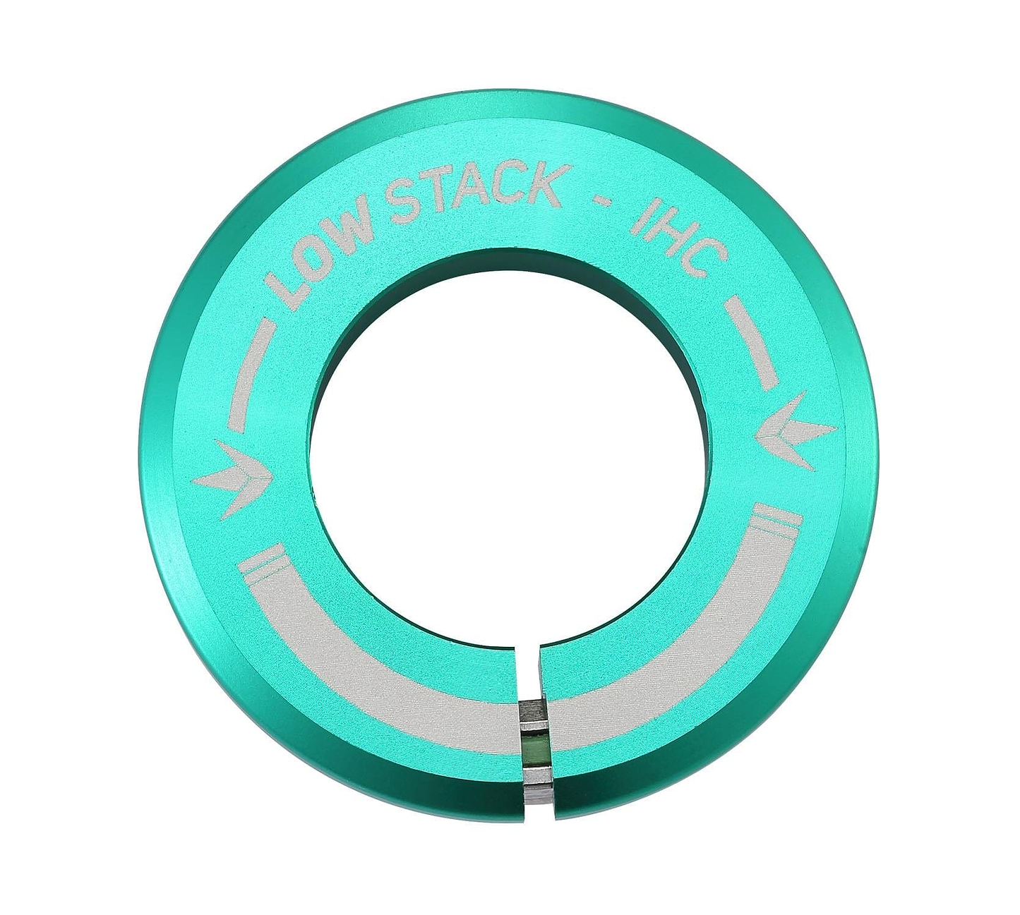 A teal metallic ring featuring arrow designs, part of the Blunt Envy Low Stack IHC Integrated Stunt Scooter Headset, is specifically designed for use with the IHC Compression System. Its shiny, reflective surface highlights its specialized purpose and mechanical precision.