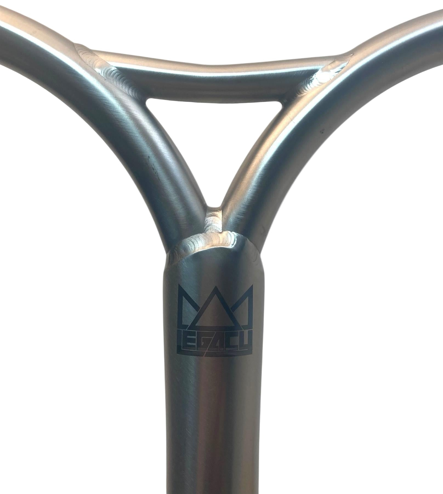 Close-up of Legacy Cut-Out Titanium Oversized HIC Stunt Scooter Y-Bars (660mm x 600mm, Chrome) with visible welds and black Legacy logo—lightweight and ideal for park riders—shown against a white background.