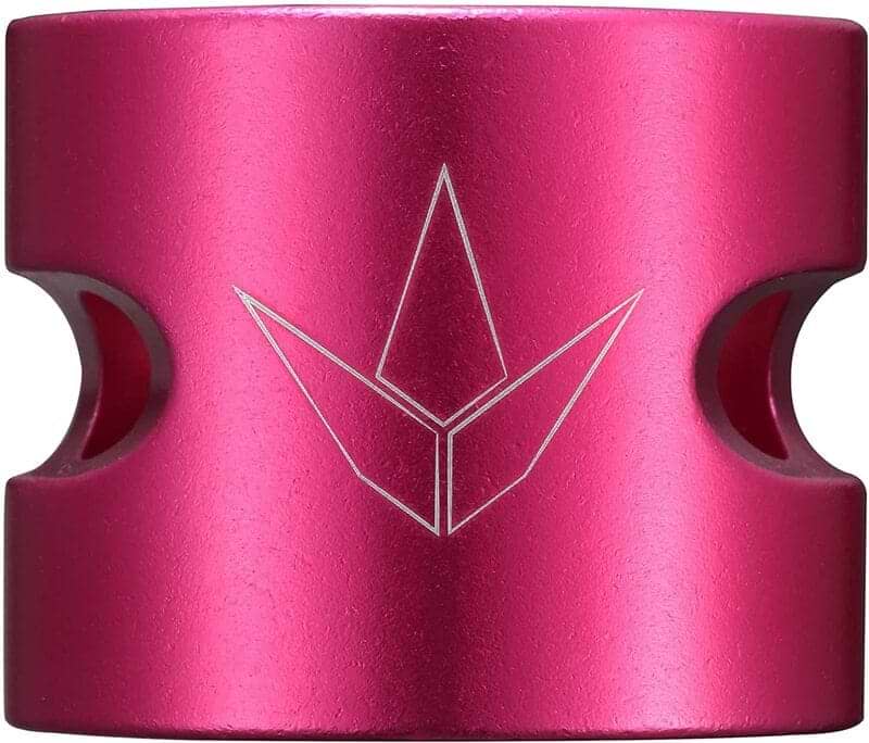 Close-up of the Blunt Envy Twin Slit 2 Bolt Oversized Scooter Clamp in metallic pink aluminium, featuring an engraved geometric logo on its surface. This lightweight scooter clamp offers a shiny texture and includes two symmetrical cutouts on the sides, making it ideal for stunt scooters.
