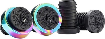Colorful ear gauges with black tops showcasing a geometric design, ideal for fans of Blunt Envy, feature linings with a rainbow gradient. These are paired with black silicone tunnels set against a plain white background, reminiscent of the vibrant style found in Blunt Envy Halo Stunt Scooter Bar Ends - Oil Slick Neochrome.