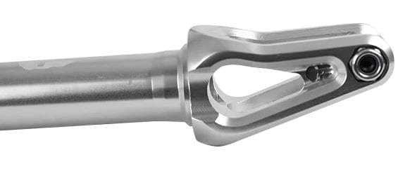 A close-up of the Supremacy Spartan SCS/HIC Stunt Scooter Forks shows a CNC milled, metallic component featuring a cylindrical shaft and a forked, open-ended connector with a small circular opening at the tip. Crafted from high-grade aluminum, this product boasts a sleek chrome finish under the Supremacy brand.