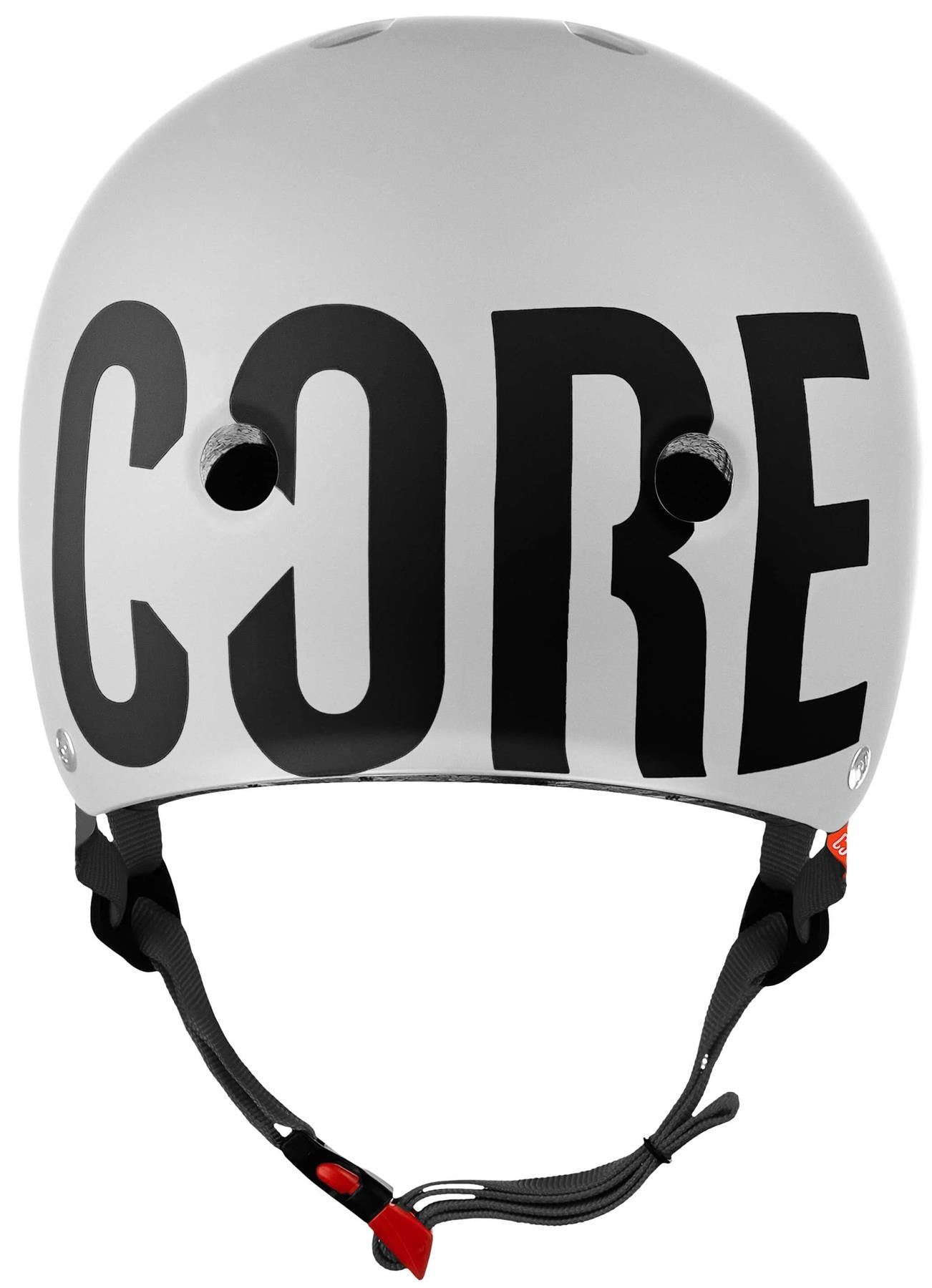 The CORE Street Skate / Scooter Helmet - White features "CORE" in bold black letters on the front, a black adjustable chin strap with red buckle, and is perfectly compatible with CORE Lux Pads for extra comfort.