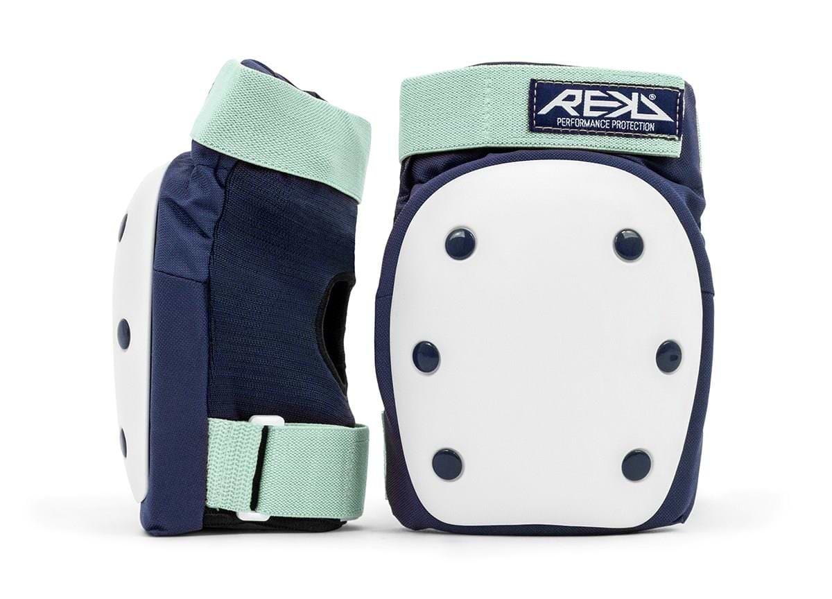 The REKD Heavy Duty Triple Skate Protection Pad Set in blue and mint offers exceptional knee protection. One of the knee pads is shown upright, highlighting the front padding and brand logo, while the other pad displays its side profile along with the fastening mechanism.